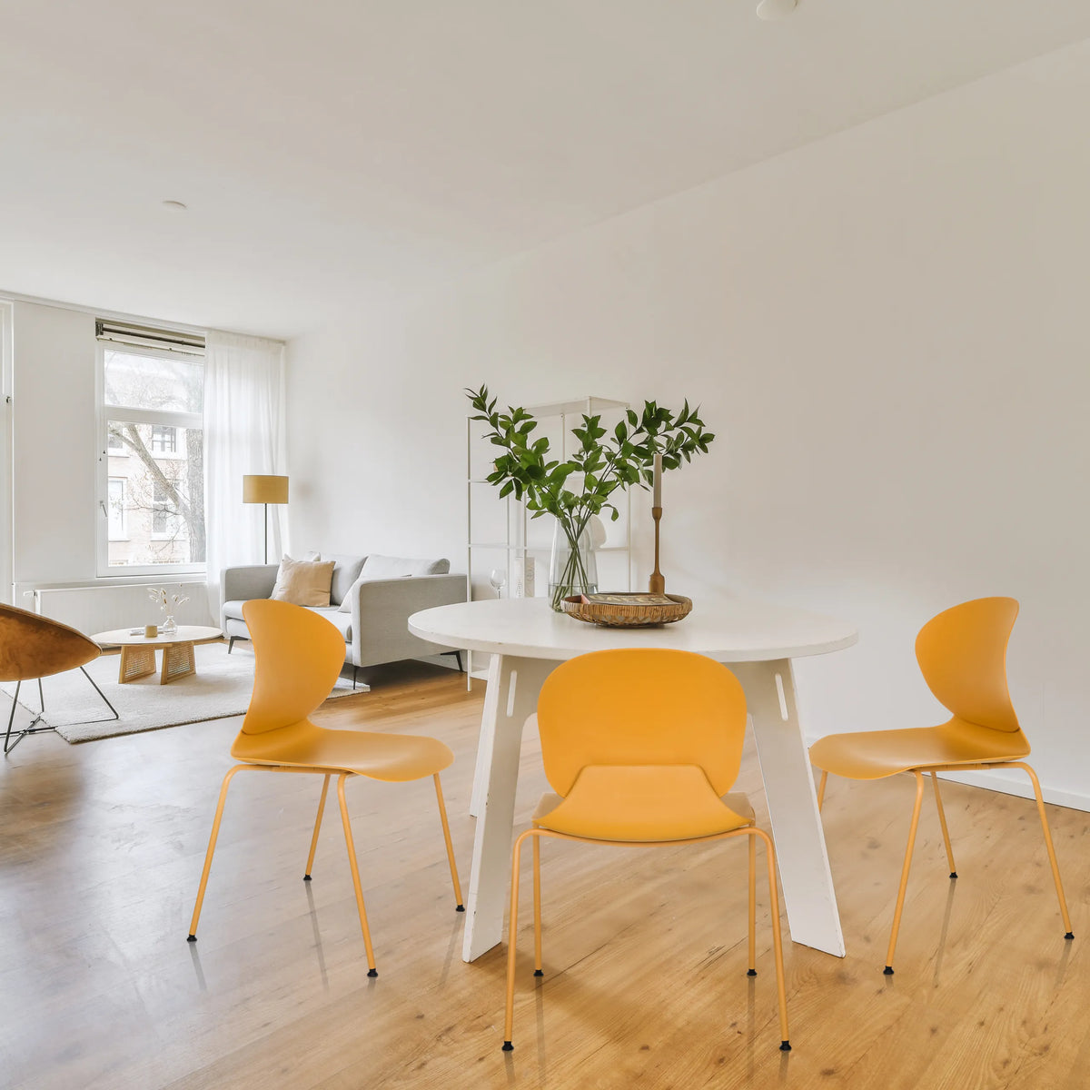 Yellow four-legged chairs T36 VI with curved seat shells and slim legs by hjh OFFICE