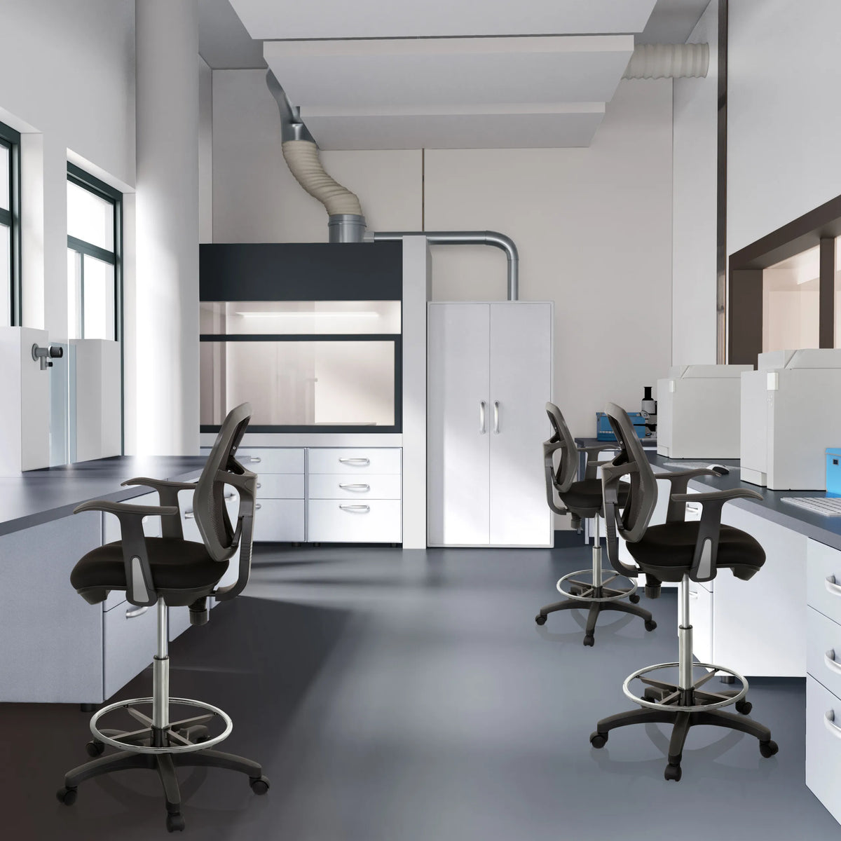 Black TOP WORK 108 counter chairs with armrests and footring in a laboratory environment by hjh OFFICE