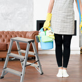 Three-step aluminium folding ladder SOLID next to a person with a cleaning bucket by hjh OFFICE