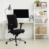 Black Professional Office Chair PRO-TEC 350 with armrests in front of a white desk in a home office by hjh OFFICE