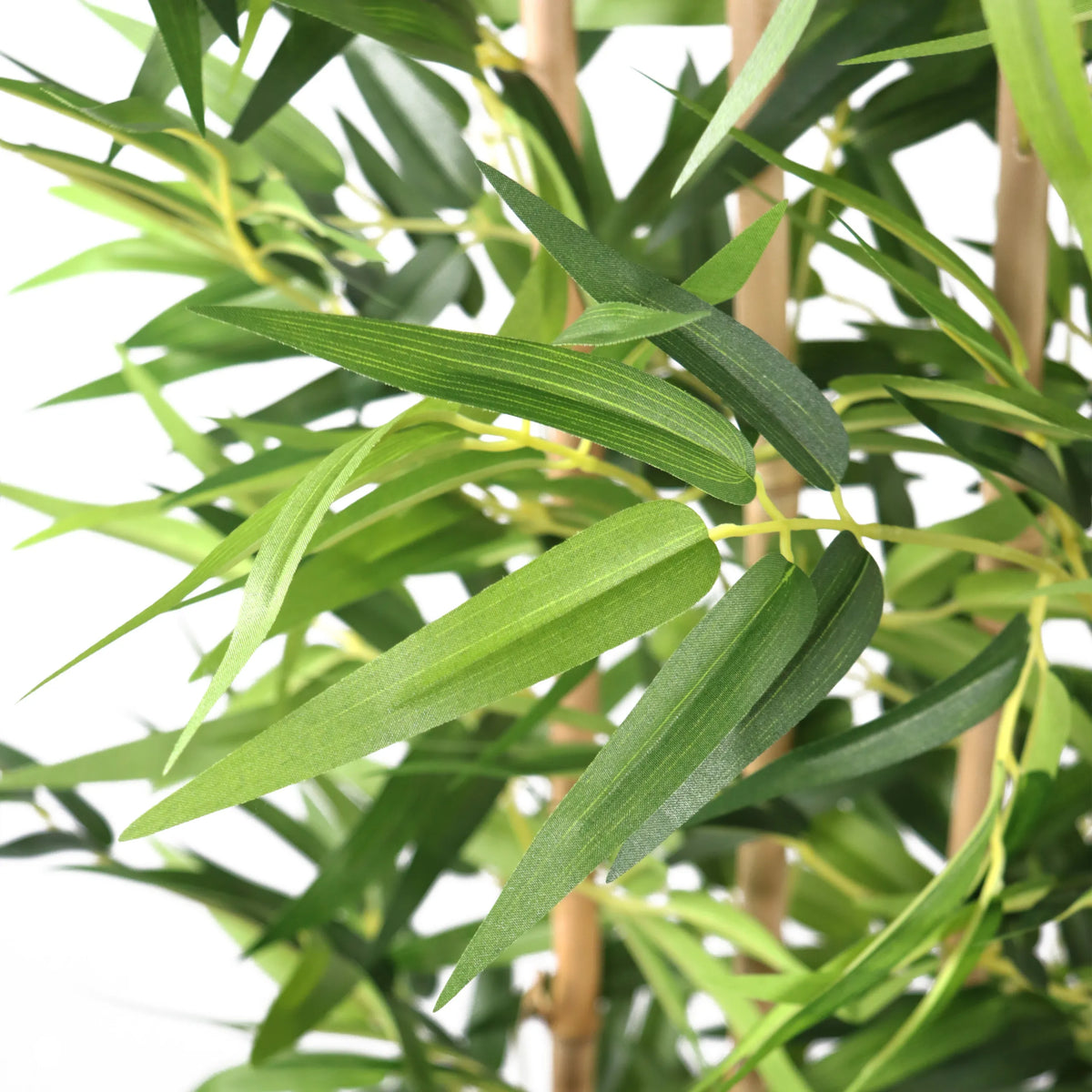 Green leaves and stems of the artificial plant BAMBUS I by hjh OFFICE