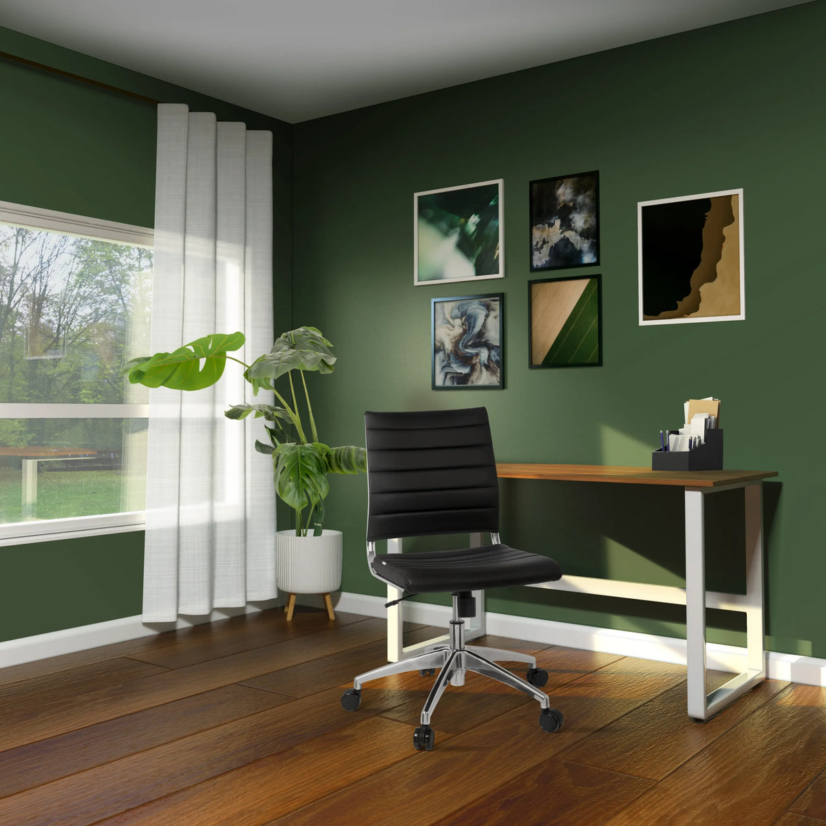 Professional Office Chair TRISHA in black with quilted stitching look and castors in front of a desk by hjh OFFICE