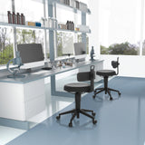 Two black TOP WORK FLEX PU swivel stools with faux leather upholstery and castors at a laboratory table by hjh OFFICE
