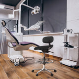 Black counter chair WORK MF with foot ring and five castors in a practice environment by hjh OFFICE