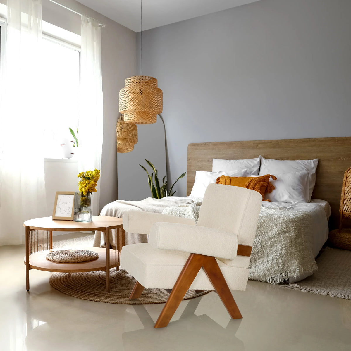 White POOLY lounge chair with wooden legs in a bright bedroom by hjh LIVING