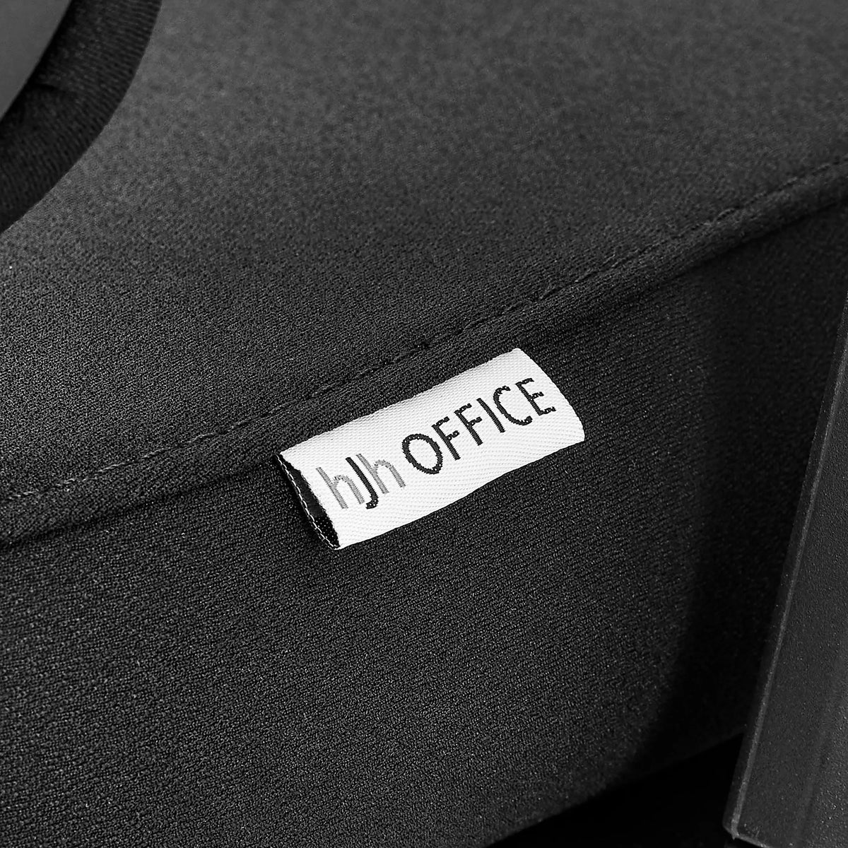 Woven logo label on the black fabric cover of the Professional Office Chair Ergomy F 2 by hjh OFFICE