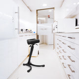 Black standing aid TOP WORK 33 with padded seat and star base in a bright sterilisation environment by hjh OFFICE