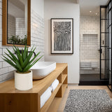 Green artificial plant Agave in a white pot on a wooden shelf by hjh OFFICE