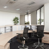 Two black TOP WORK 77 counter chairs with mesh backs and footrests at a reception desk by hjh OFFICE