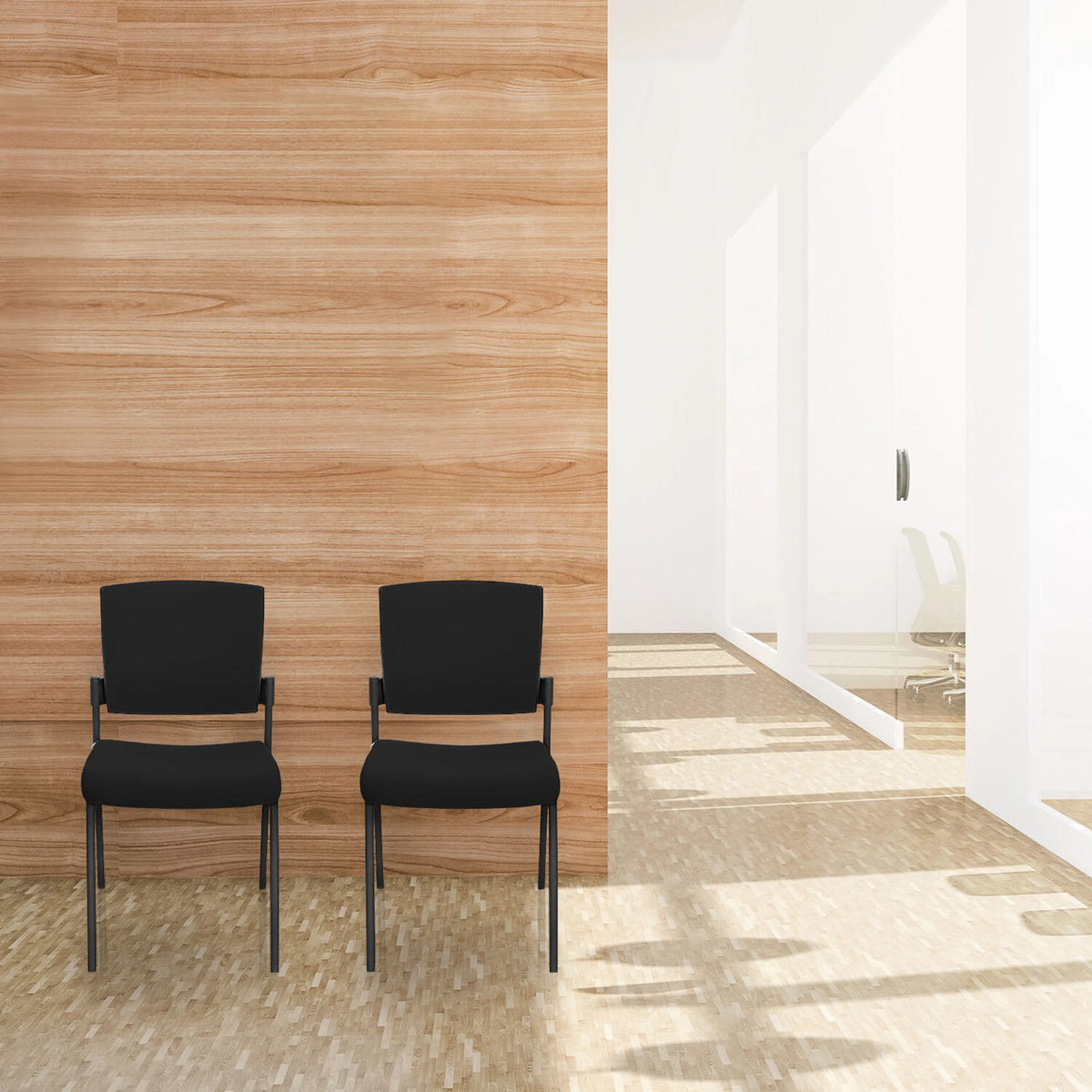 Two black four-legged chairs K9 V PRO with armrests in front of a wooden wall by hjh OFFICE