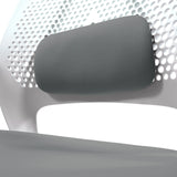 Grey headrest of the PARFERIO W home office chair in front of a perforated white backrest by hjh OFFICE