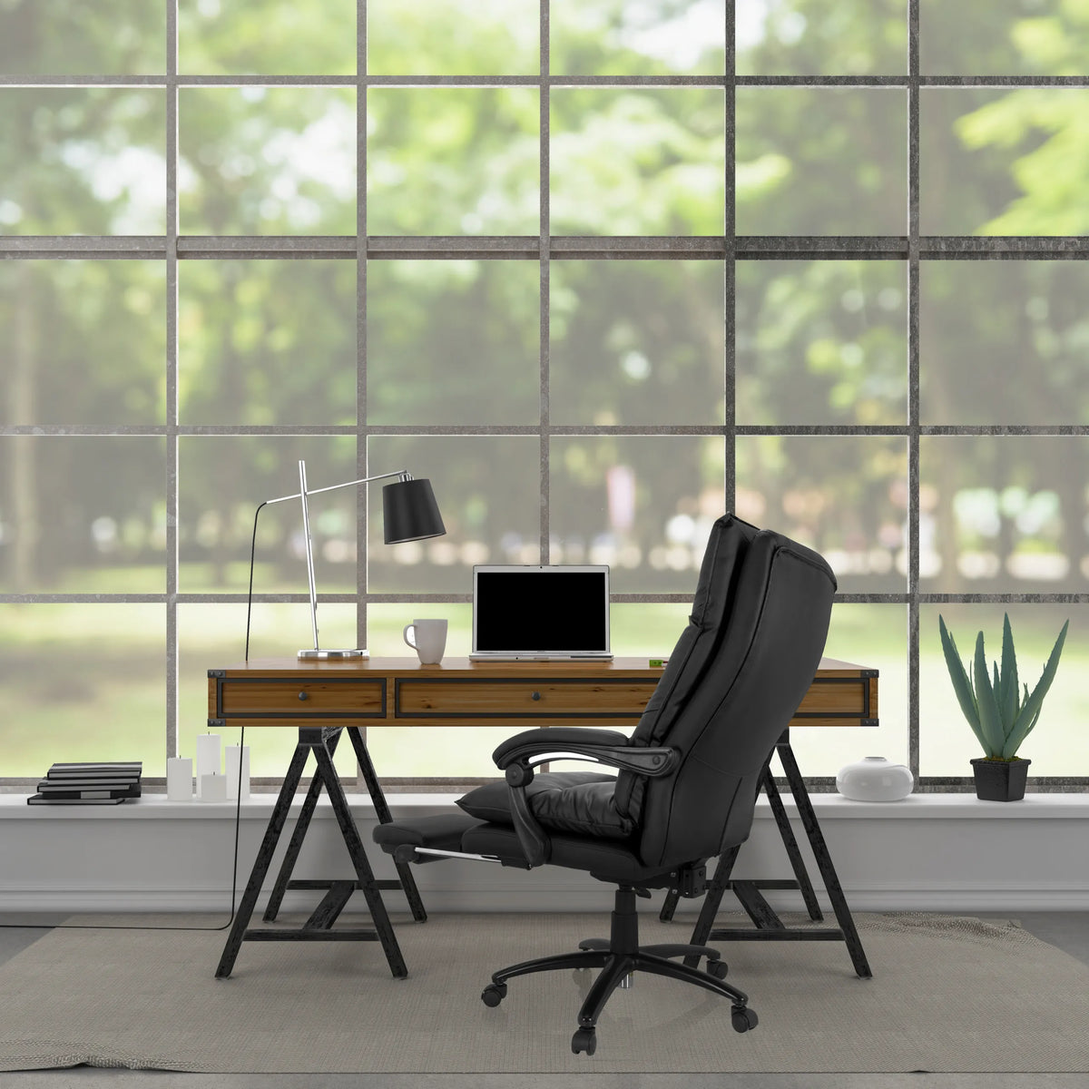 Black Home Office Executive Chair RELAX CL 200 made of faux leather at a desk by MyBuero