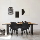 Four black Shell chairs SCANDI P at a wooden table in a modern room by hjh OFFICE