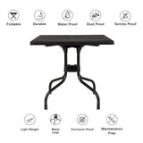 Black TRAVANO T1 folding table with metal legs and symbols for material properties and functions by hjh LIVING
