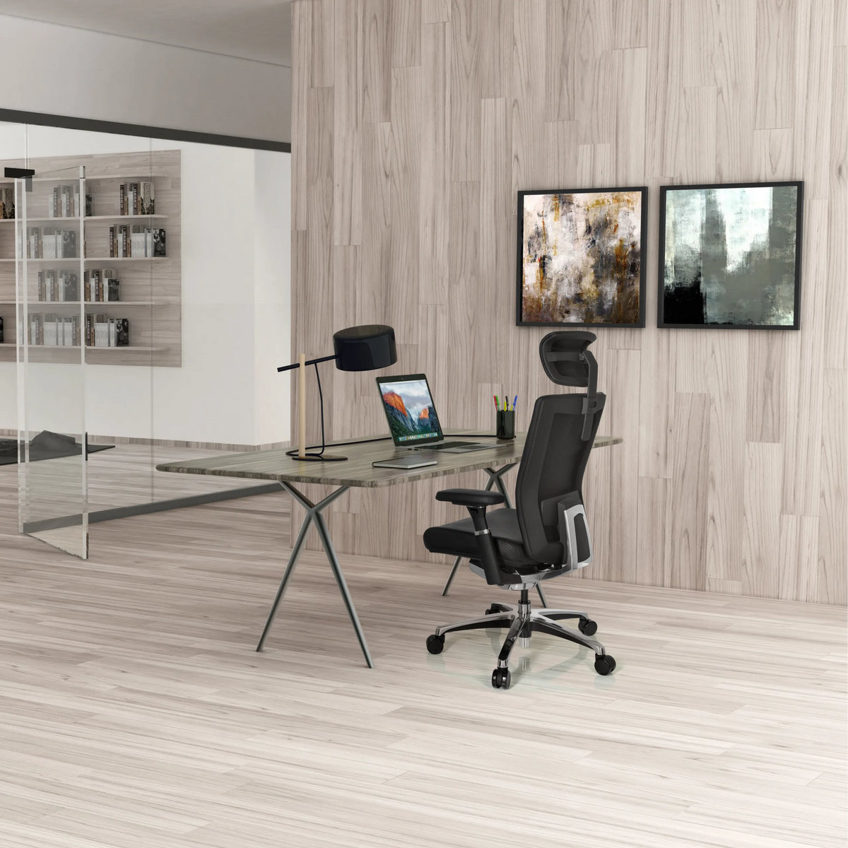 Black professional office chair NOVA made of leather at a desk in a modernly designed office by hjh OFFICE