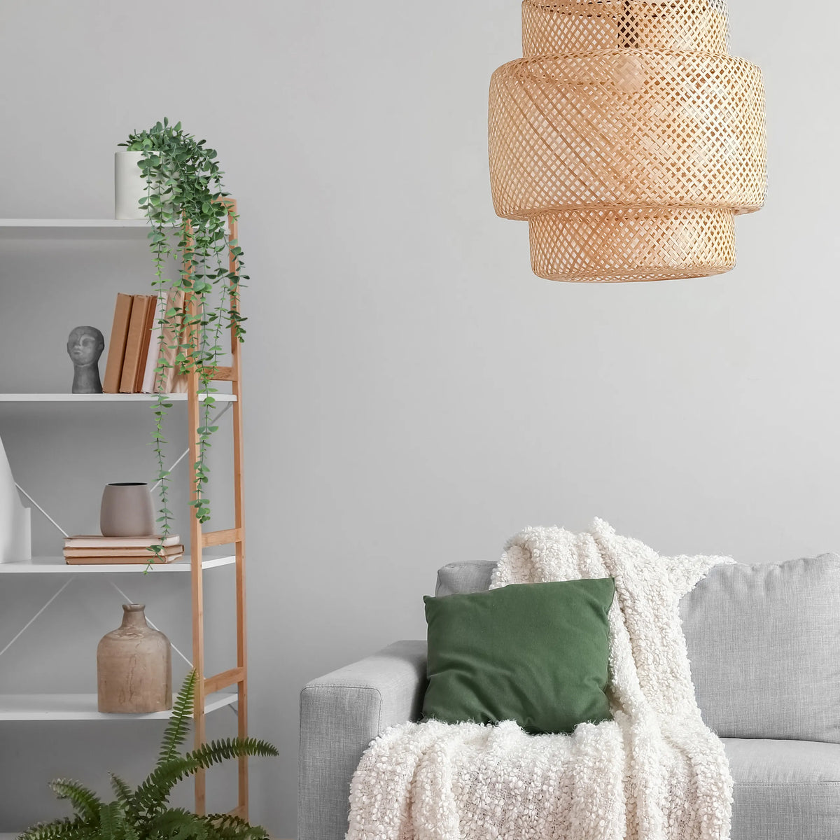 Green Artificial plant EUCALYPTUS CLIMB on a shelf next to a grey sofa by hjh OFFICE