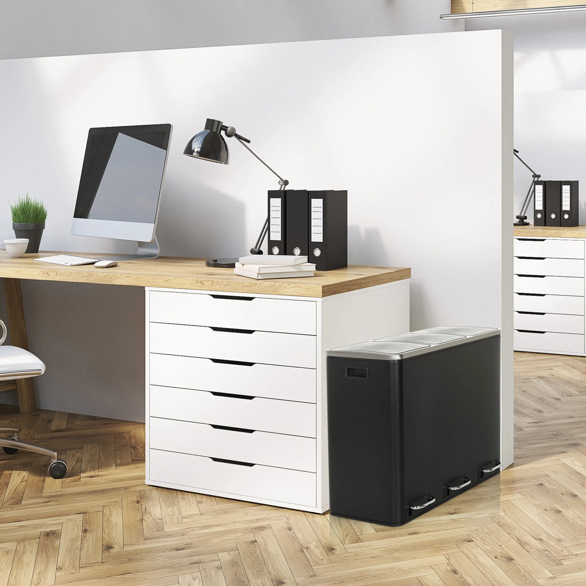 Black wastepaper bin Clean 9 with silver lid next to a desk by hjh OFFICE