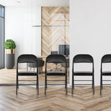 Four black TUDELA H folding chairs with faux leather upholstery in a row by hjh OFFICE