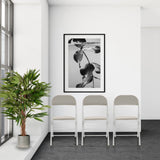 Three grey TUDELA W folding chairs with faux leather upholstery in a bright room by hjh OFFICE