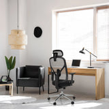 Professional Office Chair RALOO PRO in black with mesh backrest and headrest at a desk by hjh OFFICE