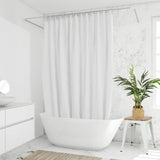 Green Artificial plant CHAMAEDOREA in a woven basket on a white stool by hjh OFFICE