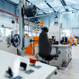 Backrest of the RESISTIO XXL professional executive chair in black in an industrial environment by hjh OFFICE