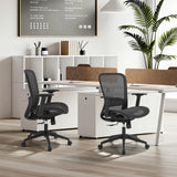 Two black Air Port 2 professional office chairs with mesh back and mesh seat at a white desk by MyBuero