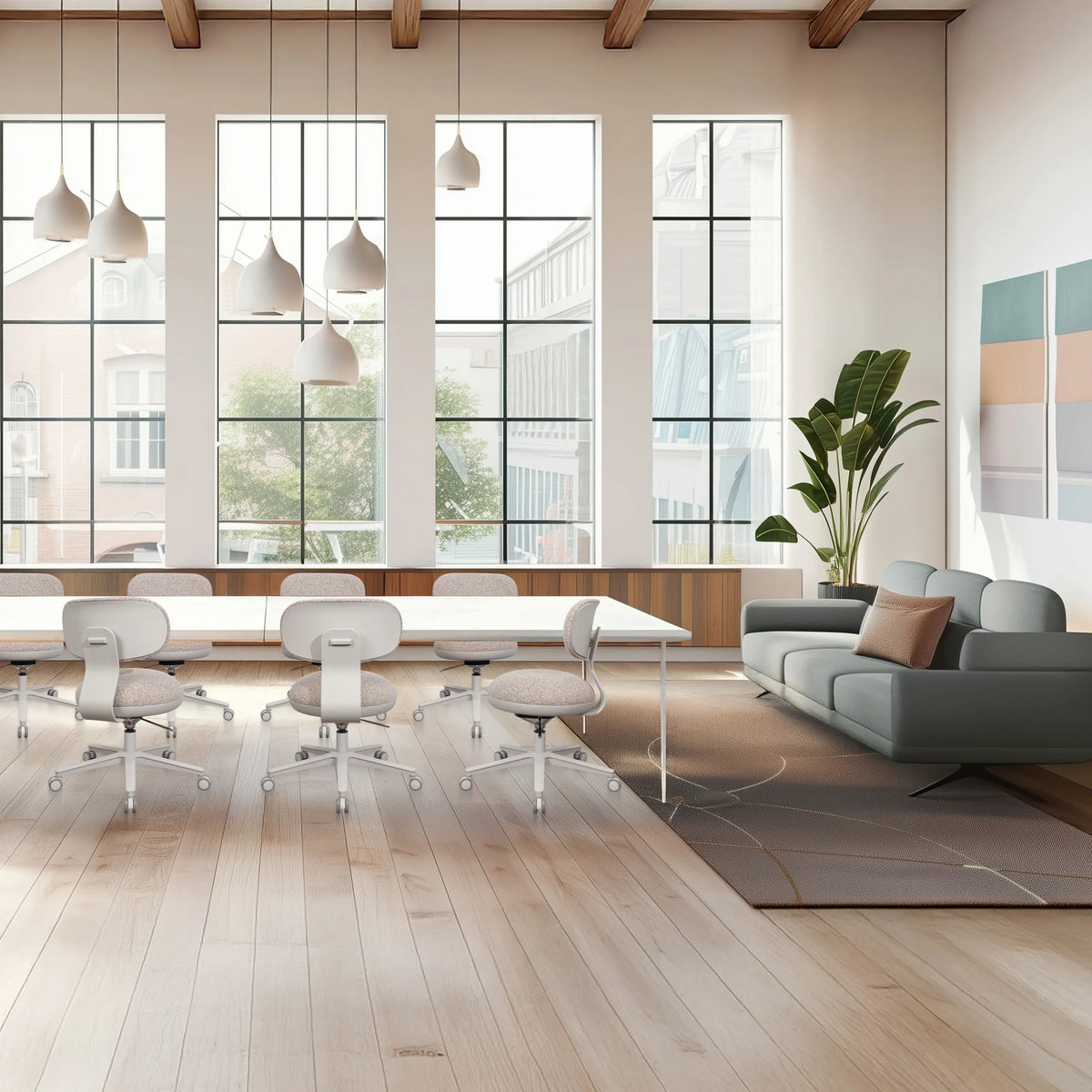 Home Office Chair SITMOTION W in grey with castors and armrests in a bright room by hjh OFFICE