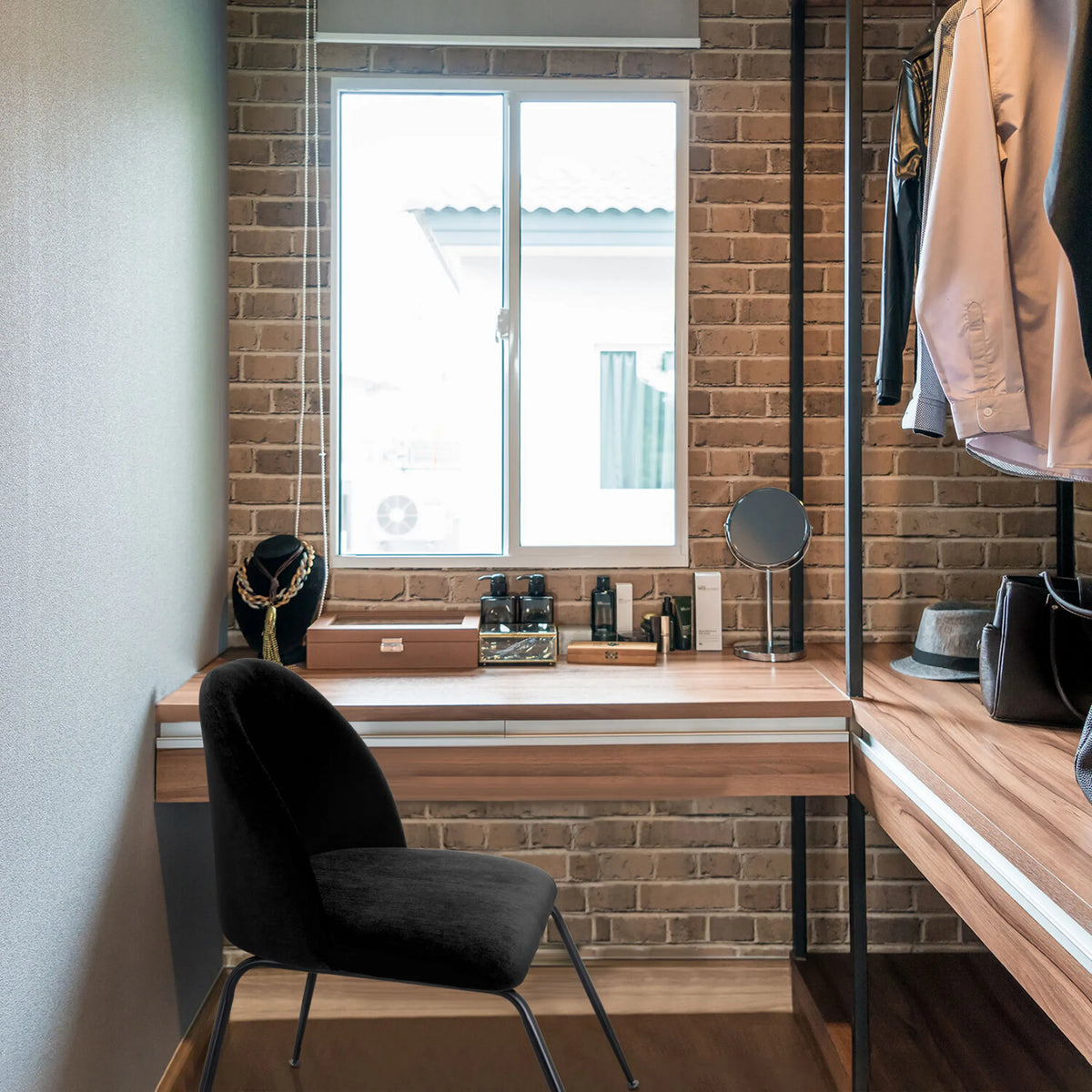 Black upholstered chair VELVO with slender metal legs in front of a wooden dressing table by hjh OFFICE
