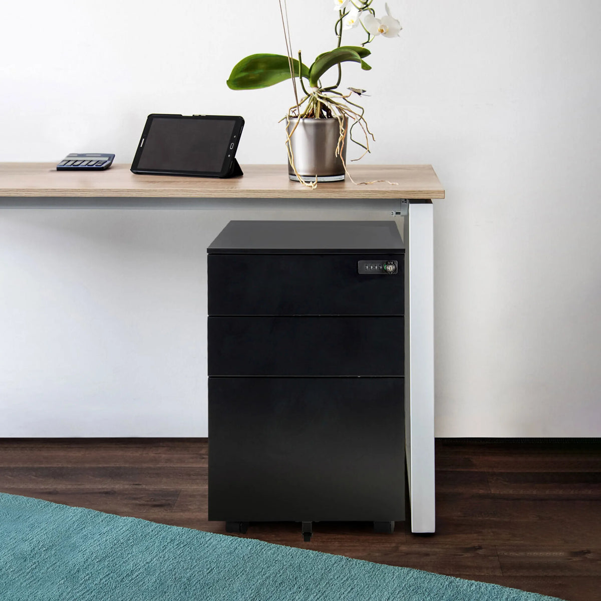 Black metal mobile drawer unit COLOR OS I with three drawers and castors under a desk by hjh OFFICE