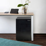 Black metal mobile drawer unit COLOR OS I with three drawers and castors under a desk by hjh OFFICE