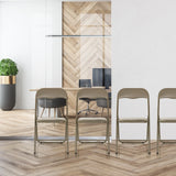 Four taupe PVC folding chairs TUDELA BASIC standing in a row by hjh OFFICE