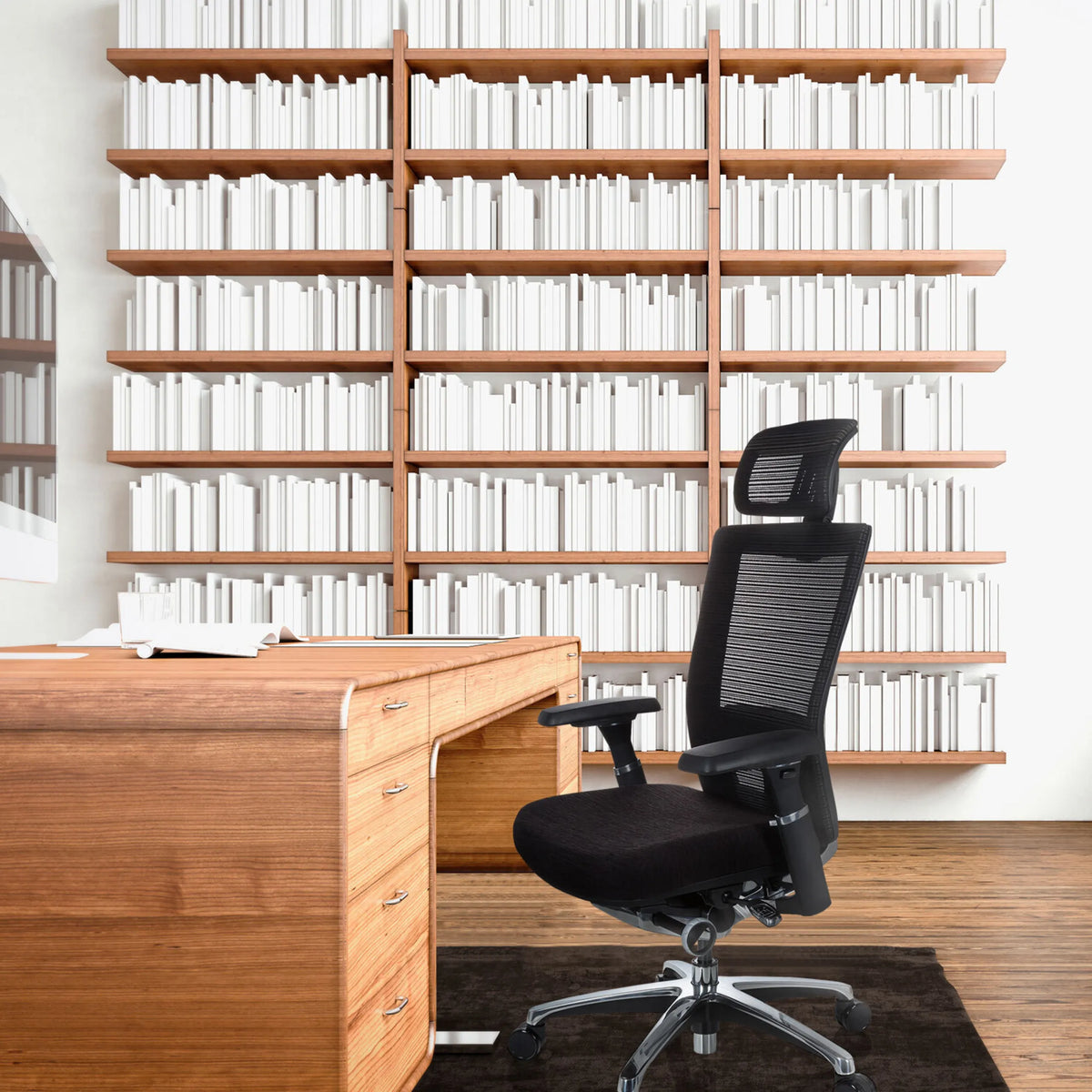 Black High End Office Chair NOVA PRO I with headrest and mesh back in front of a wooden desk by hjh OFFICE
