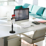 Black FLEXMOBI II mobile phone & tablet holder on a white desk next to a monitor by hjh OFFICE