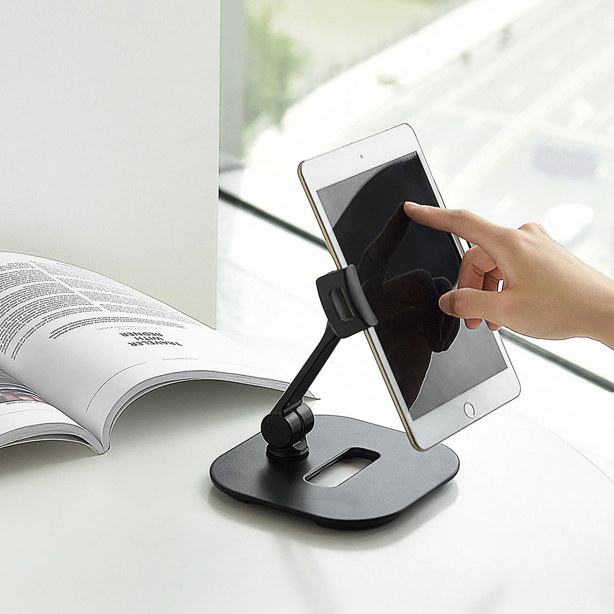 Black mobile phone & tablet holder FLEXMOBI IV with a tablet inserted on a white background by hjh OFFICE