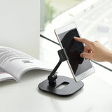 Black mobile phone & tablet holder FLEXMOBI IV with a tablet inserted on a white background by hjh OFFICE