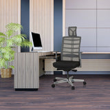 High End Office Chair SKARIF in black-grey in front of a desk in a modern office by hjh OFFICE