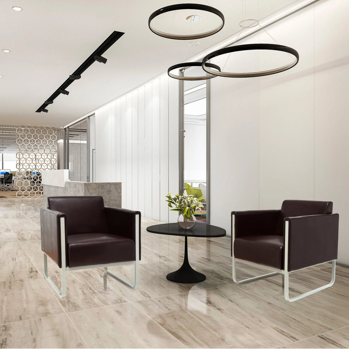 Two brown ARUBA upholstered armchairs with silver-coloured metal frames and a round side table by hjh OFFICE