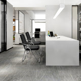 Two black ESTO folding chairs with chrome-plated metal frames in a modern office room by hjh OFFICE
