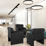 Three black CARIPITO lounge chairs with fabric upholstery in a modern office environment by hjh LIVING