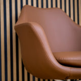 Brown upholstery and armrest of the Lounge Chair ARTEMIA by hjh OFFICE