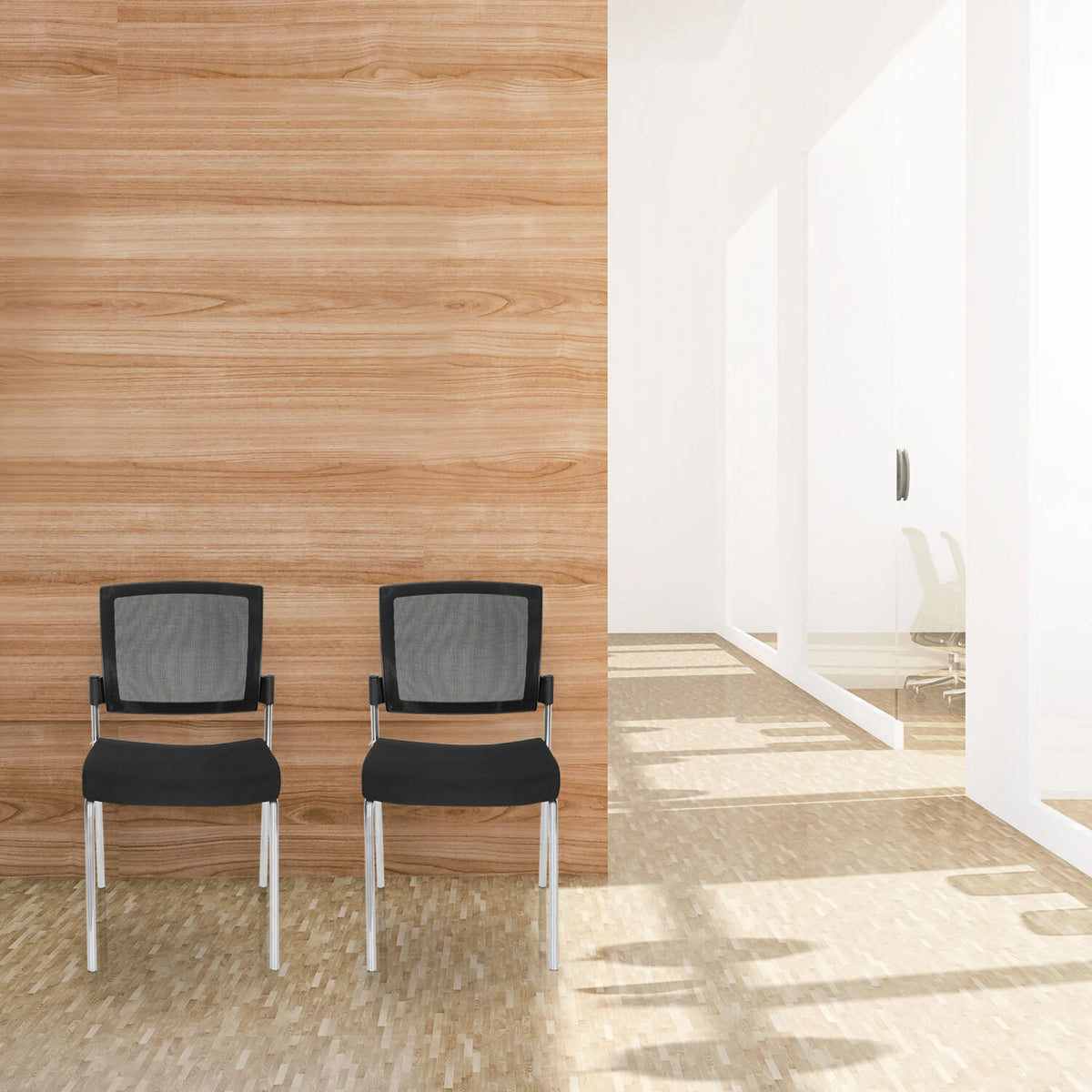 Two black K9 V four-legged chairs with mesh backrests and metal legs in front of a wooden wall by hjh OFFICE