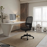 Black Professional Office Chair Minoro B with mesh backrest in a bright home office by hjh OFFICE (AI-generated image)