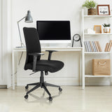 Black Home Office Chair COSIO I with armrests and castors at a white desk by hjh OFFICE