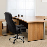 Black Swivel Chair BUILDER XXL I made of faux leather at a desk by hjh OFFICE