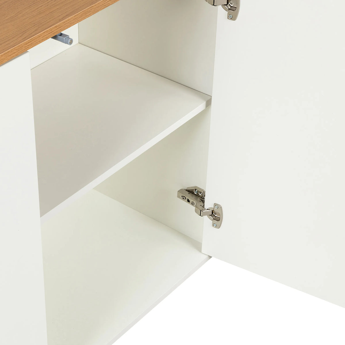 Door hinges and white shelf of the KELO S Sideboard in white and oak by hjh LIVING