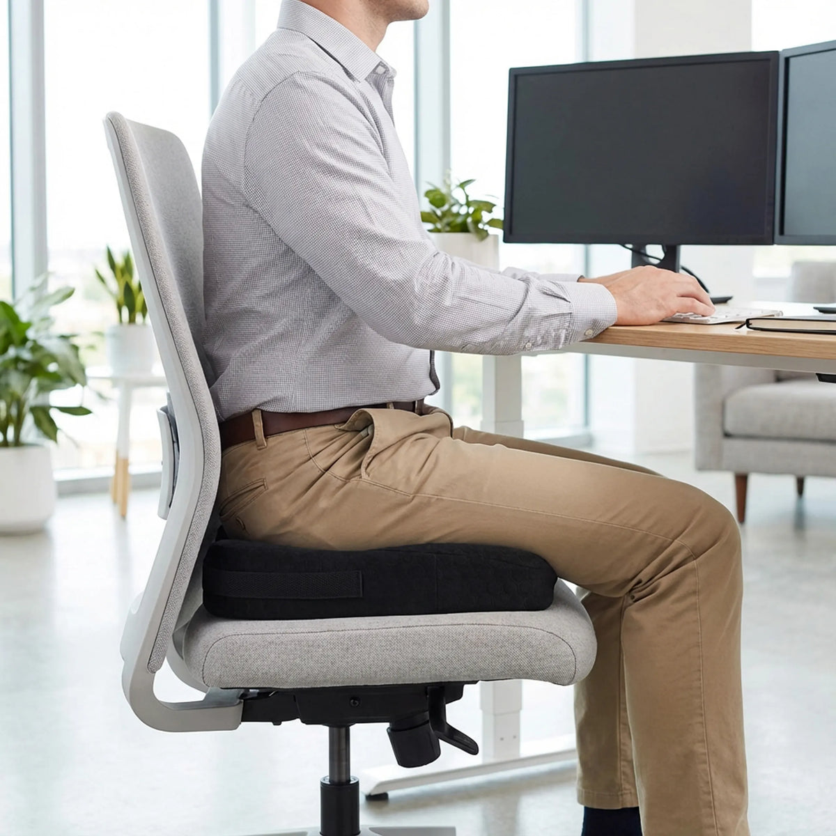 Black Seat Cushion MEDISIT II on a light grey office chair by hjh OFFICE