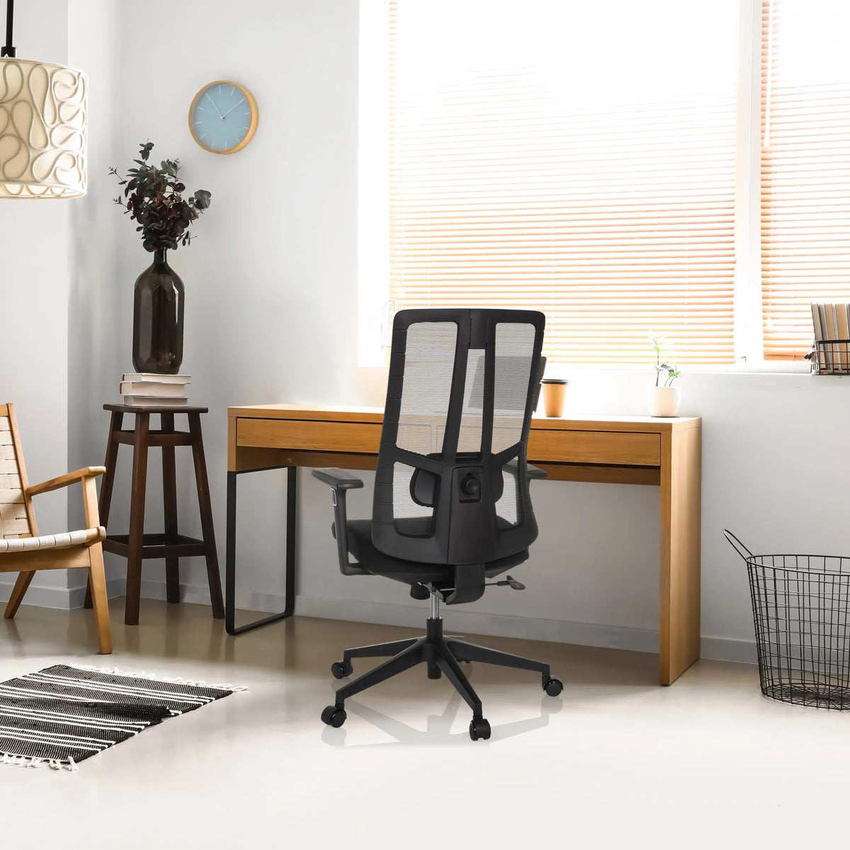 Black Professional Office Chair TRAMORE BASE with mesh backrest at a wooden desk by hjh OFFICE