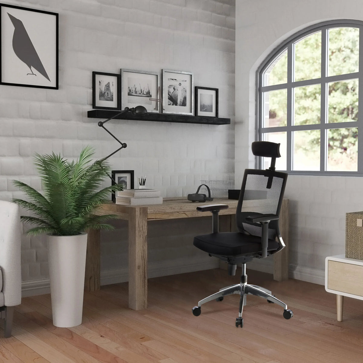 Black Professional Office Chair PORTO MAX with mesh back and headrest at a wooden table by hjh OFFICE