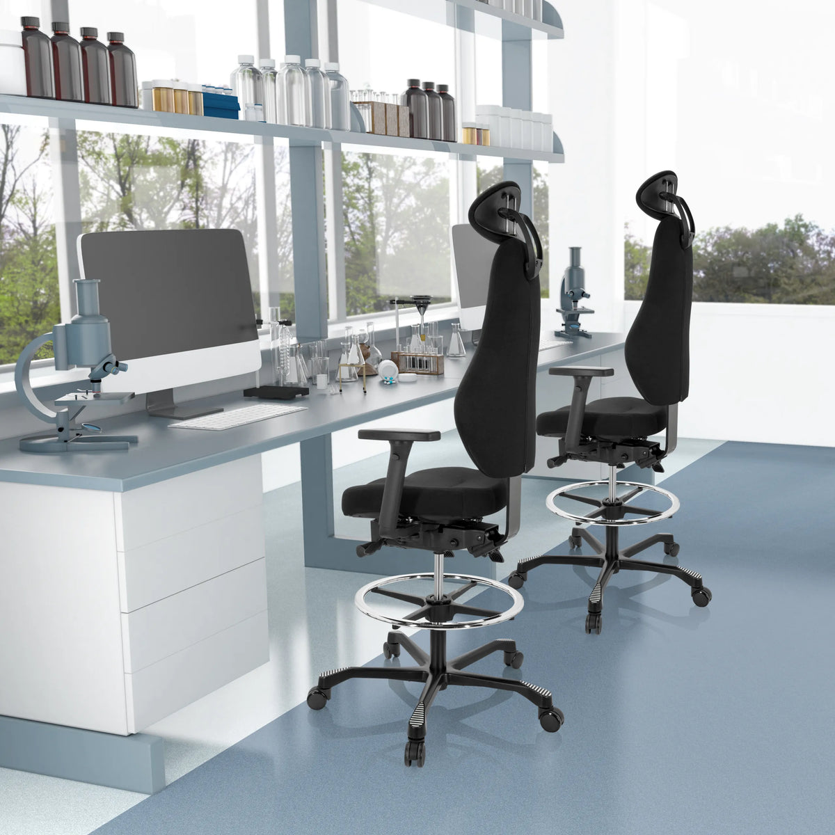 Two black RESISTIO WORK counter chairs with footrest and headrest in a laboratory by hjh OFFICE
